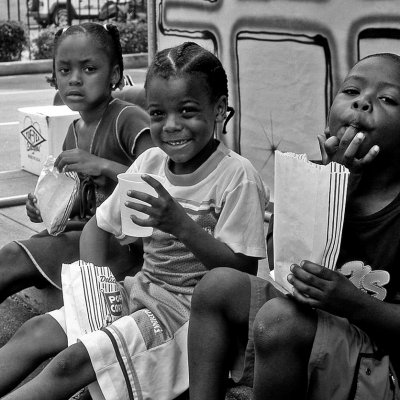 Children eating popcorn